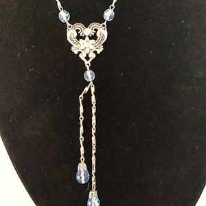 Silver and blue necklace and earring set
